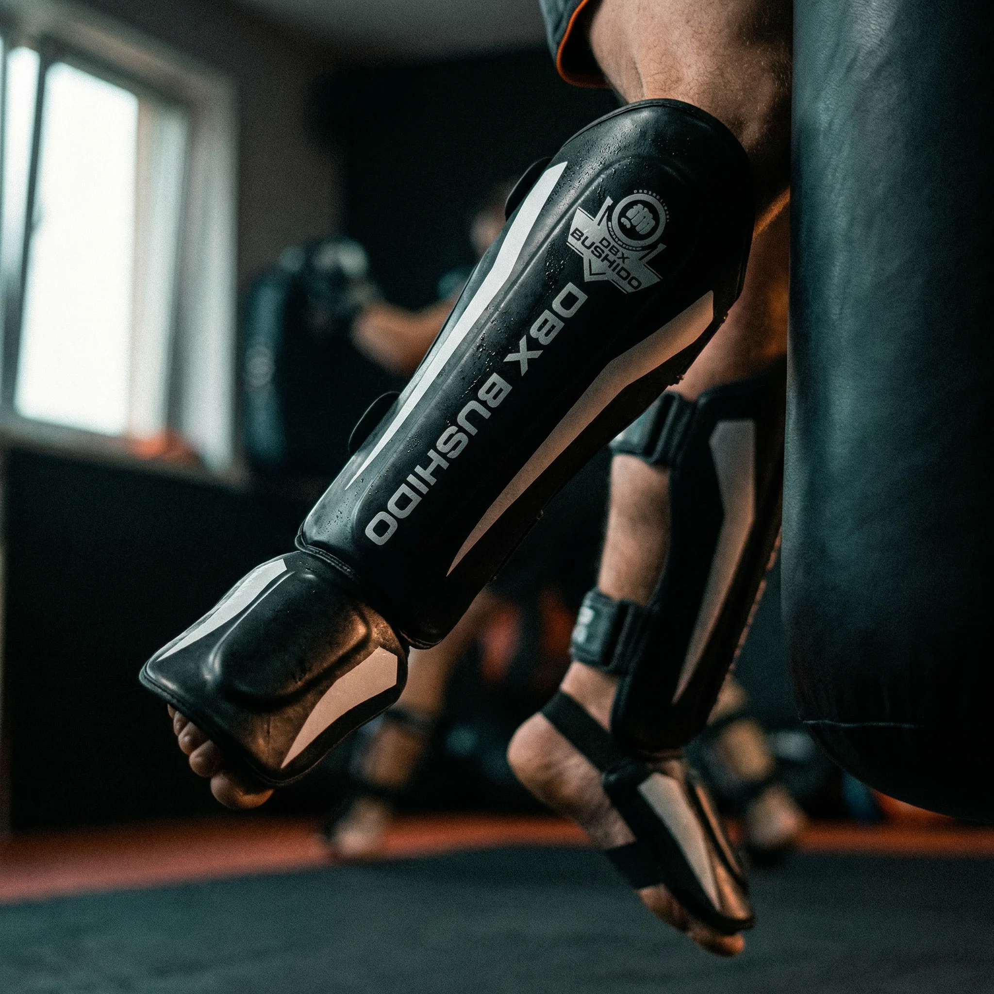  Ochraniacze piszczeli stóp goleni DBX Bushido